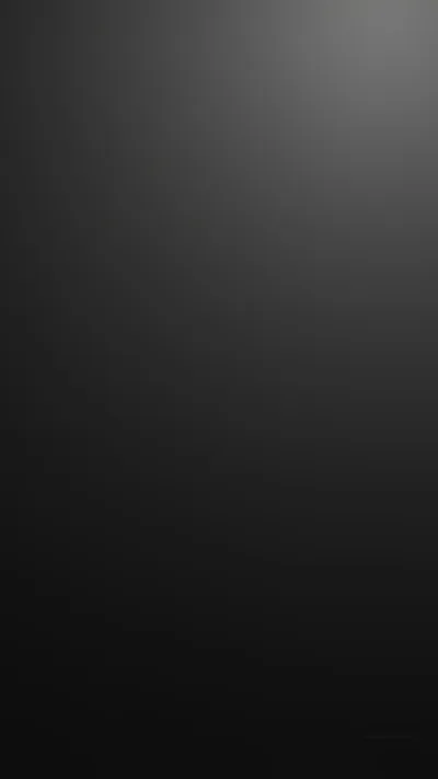 A soft light in the upper right fades to near-black across the frame — a plain phone background.
