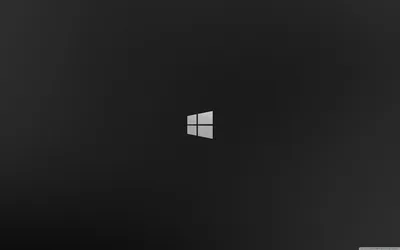 One small white window icon floats slightly above centre on a grey-to-black gradient, with nothing else in the frame.
