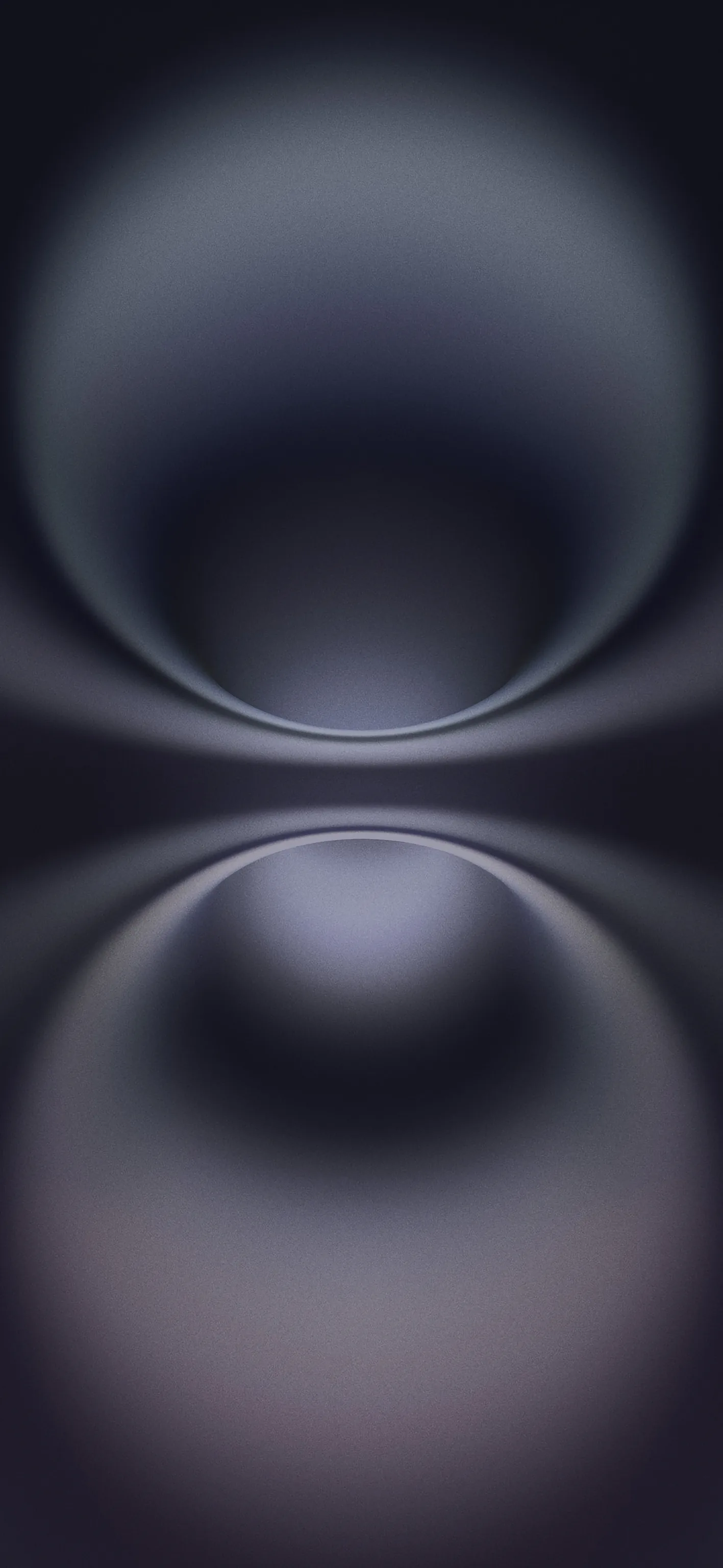 Two blurred lilac-grey domes face each other across the middle of the frame, the gradient falling away to near-black at both ends.