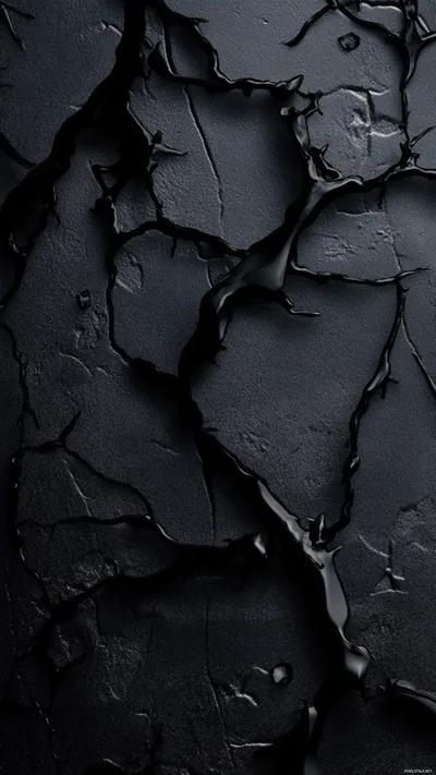 Thick black paint has split and peeled into plates, deep shadow filling the gaps where the layers lifted away.