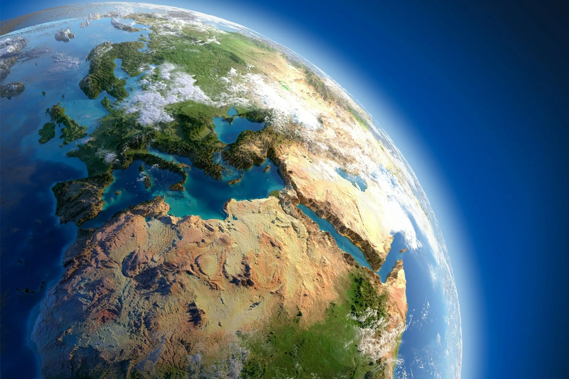 A raised-relief globe with exaggerated mountains and bright green lowlands, tilted so Europe, the Sahara and the Red Sea fill the frame edge to edge.