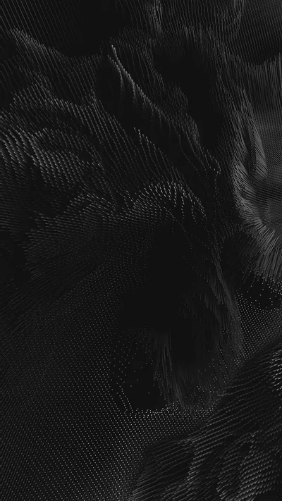 A dune-like surface built from fine ridged mesh rolls across the frame, the light raking in from the left.