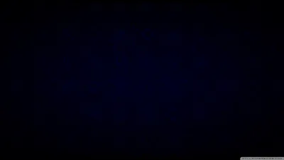 Almost the whole frame is black, with a barely visible navy haze pooling in the middle — close to true #000000 for AMOLED panels.