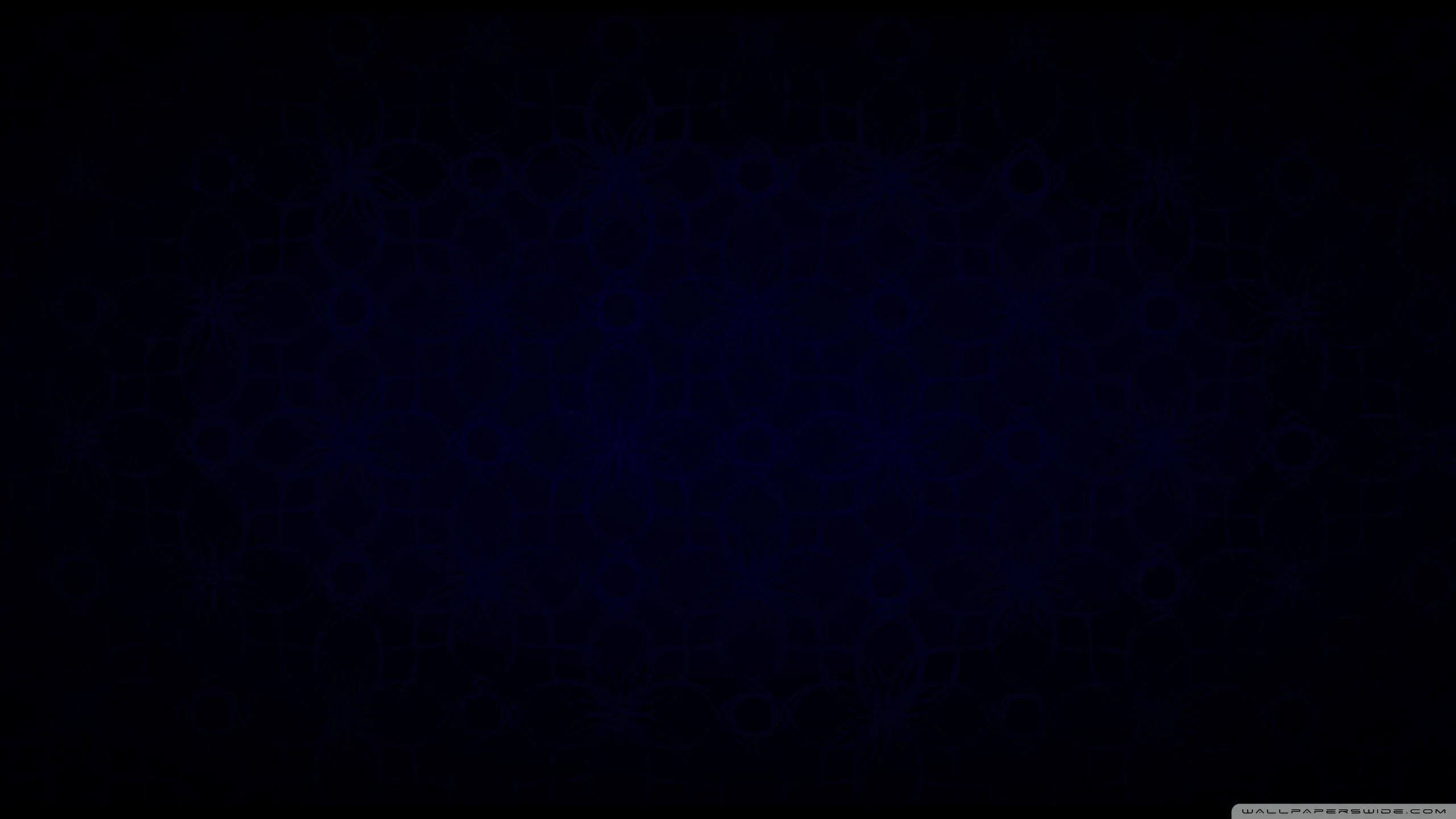 Almost the whole frame is black, with a barely visible navy haze pooling in the middle — close to true #000000 for AMOLED panels.