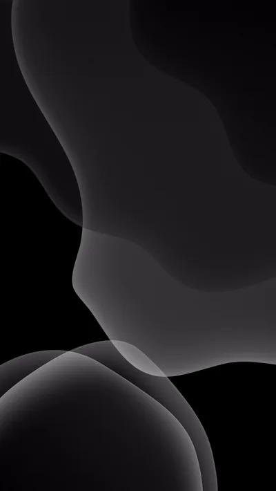 Rounded translucent forms stack down a tall black frame, overlapping edges lifting to soft grey while the corners stay fully unlit.