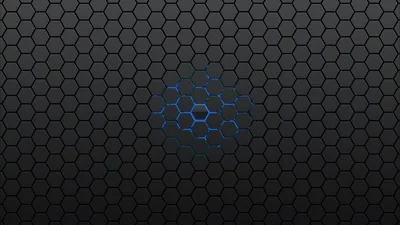 A tight honeycomb mesh fills the dark grey frame, one cluster of cells just left of centre glowing cold blue.