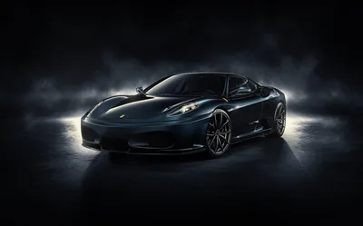 Beams from behind throw pale fog around a black F430, leaving the bonnet and windscreen dark while the outline glows.