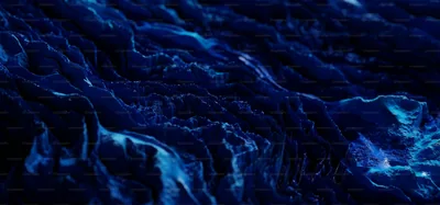 Rippled water stretches to a flat horizon in navy, foam picked out in pale blue along each crest, the sky above almost entirely black.