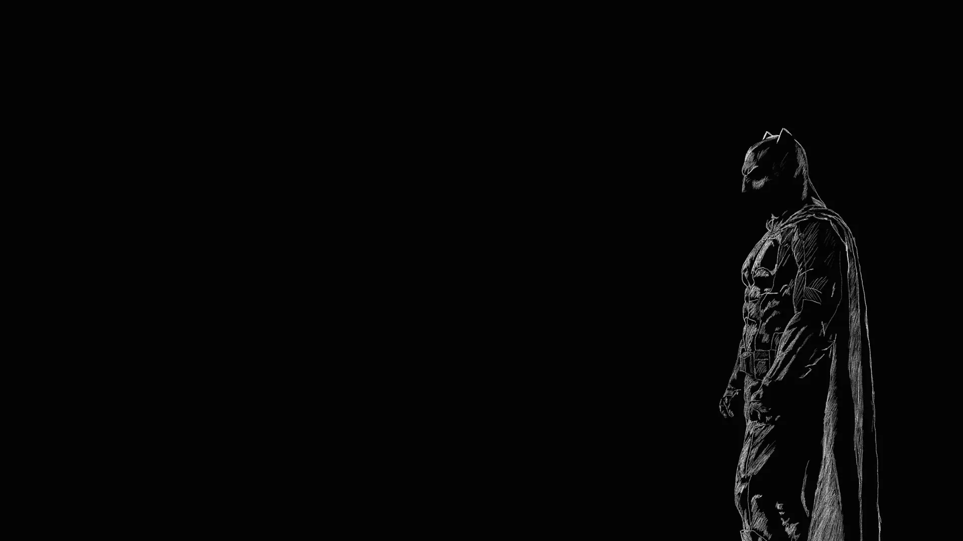 The cowled figure stands at the right edge in near-black monochrome, cape hanging straight down, the whole left two-thirds of the frame left empty.