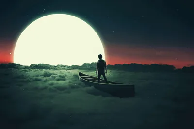 Standing in a drifting canoe, a boy rides a sea of clouds toward an enormous rising moon; the deep red-black sky above suits OLED lock screens.
