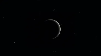 A thin sliver of light curves along one side of a large planet, the rest of its disc lost against black space.