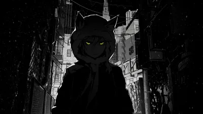 Yellow eyes glow from under a hood with cat ears, snow drifting through a monochrome street of tall buildings that fade to black at the edges.