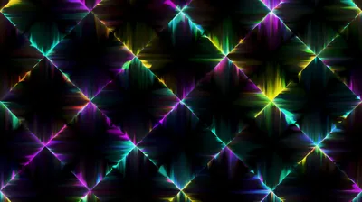 Bursts of green, magenta and yellow light repeat in a diagonal diamond grid, each one smearing sideways into horizontal streaks against the black gaps.