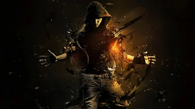 A hooded fighter with blades erupts into orange embers and shattered fragments, the corners of the frame left deep brown-black.