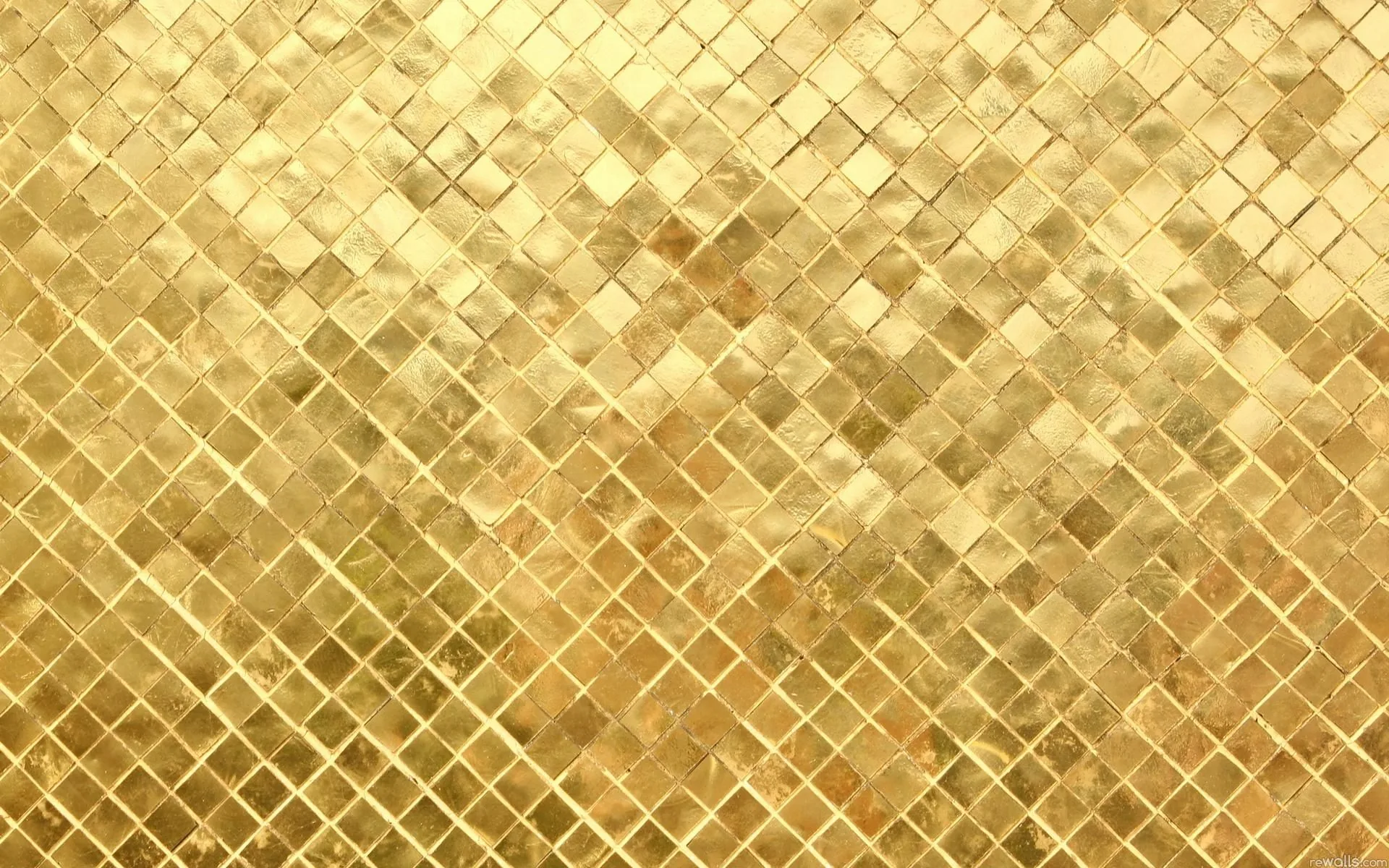 Tiny square tiles laid on the diagonal, each catching the light a little differently so the wall shimmers without any one bright spot.
