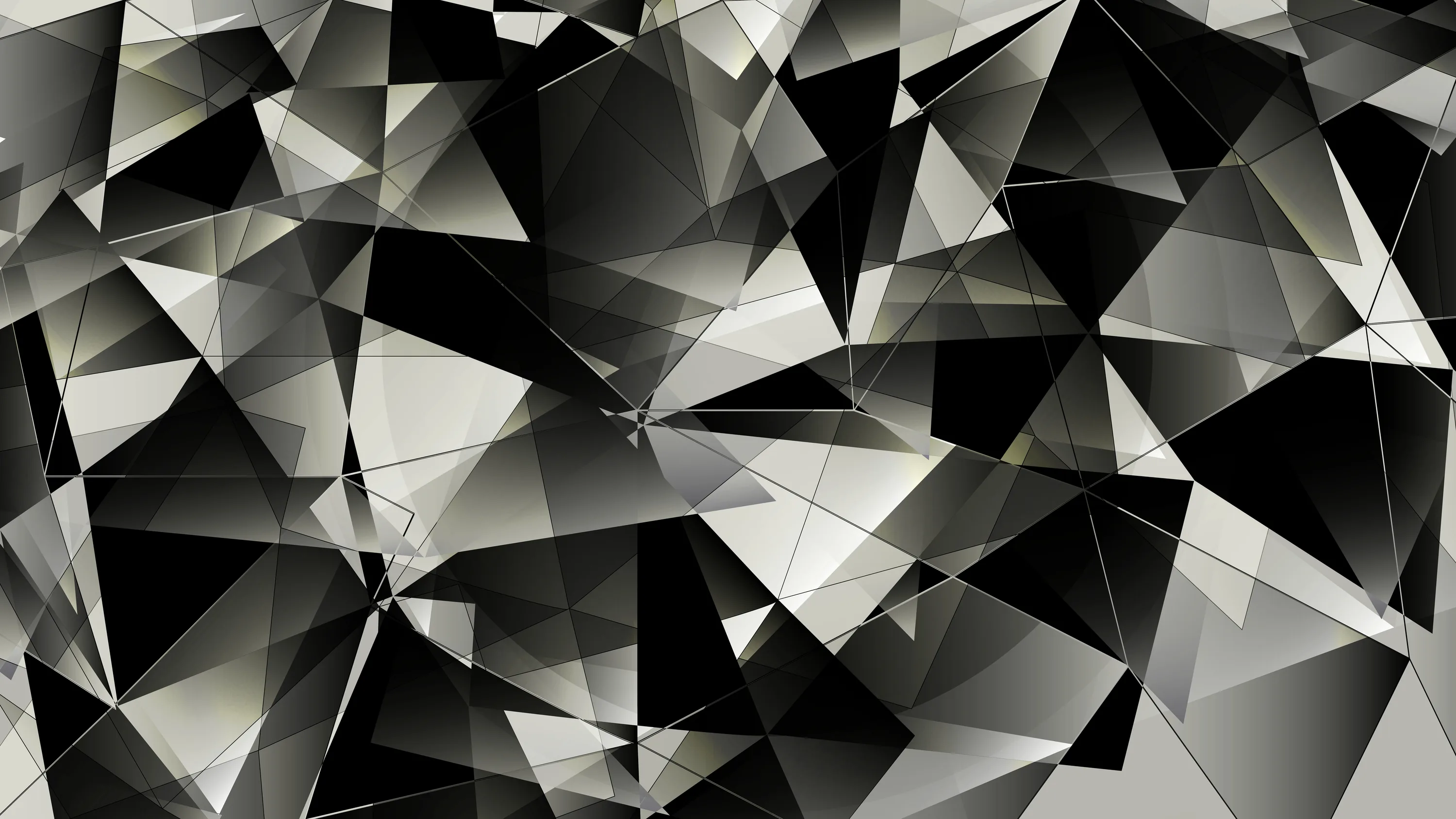 Broken triangular planes overlap edge to edge in black, grey and white, giving the whole surface a cracked glass look.