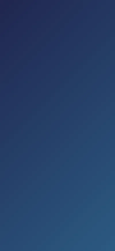 A single quiet gradient from deep navy to slate blue, brightening toward the lower right — nothing in it competes with icons or widgets.