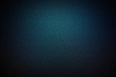 A whisper-fine weave textures a deep teal field that is brightest just above centre, every border fading to black so icons along the edges stay legible.