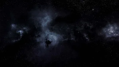 Dim grey nebulosity drifts through a wide star field, the lower half left dark enough for desktop icons to stay readable.