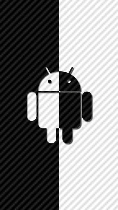 The Android robot stands dead centre where a black half meets a white half, each side of the figure inverted against its background.