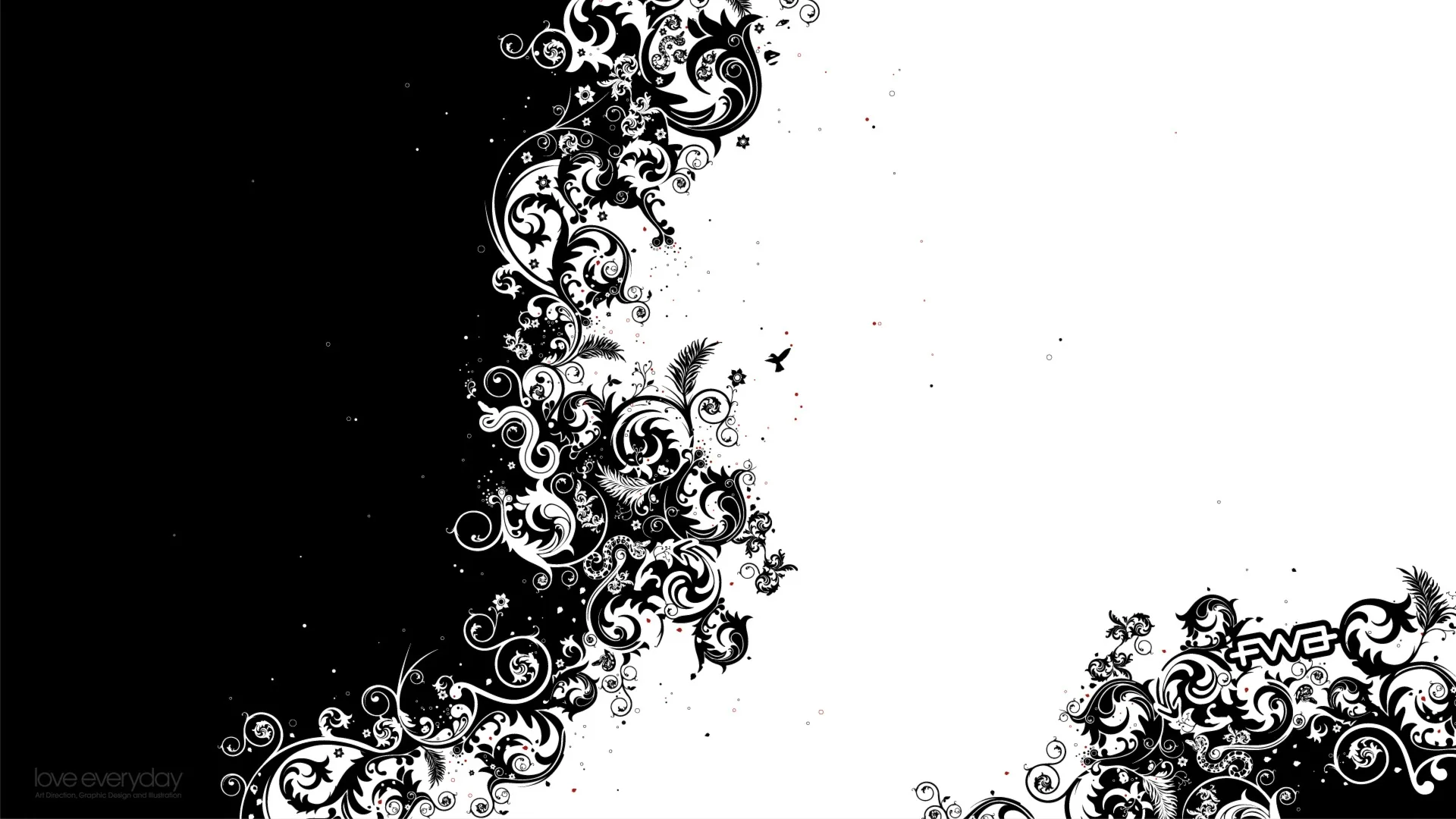 Ornate vine filigree spills down the centre where a black half meets a white one, each side reversing into the other.