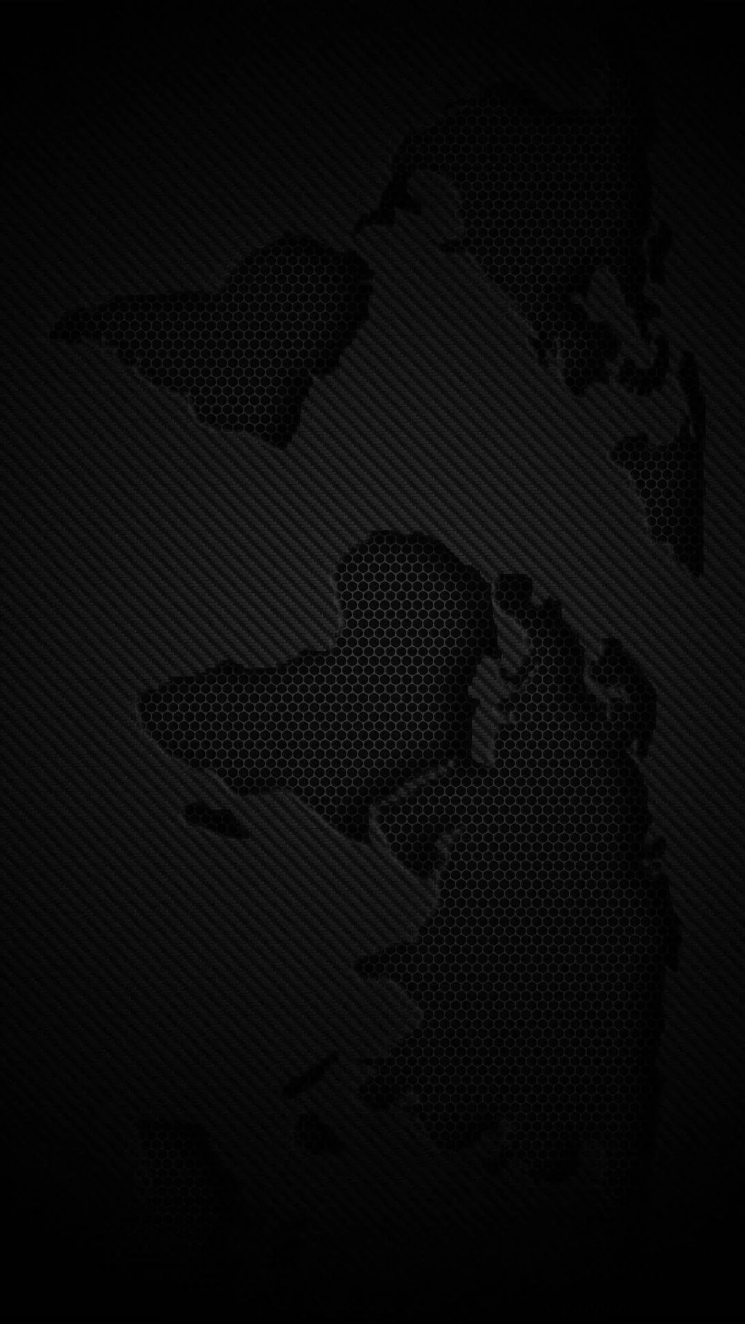 The continents cut out of a fine carbon weave, the landmasses sitting flat black against the textured oceans.