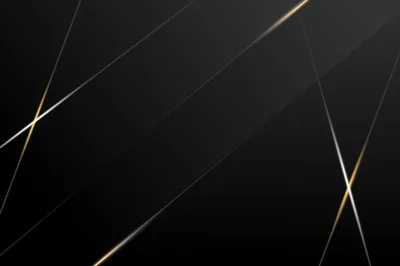 Thin gold and silver lines cross near the corners of a plain black field, small glints sparking where they meet, the whole centre left empty for a desktop.