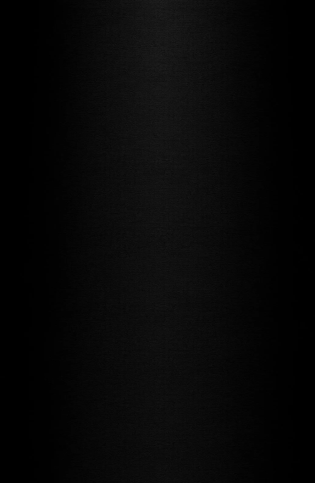A tall near-black panel with a barely lighter column running down the left of centre, the surface carrying a fine woven grain.