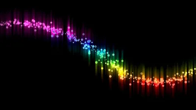 A band of coloured points curves through the frame like a sound wave, brightest at the crest.