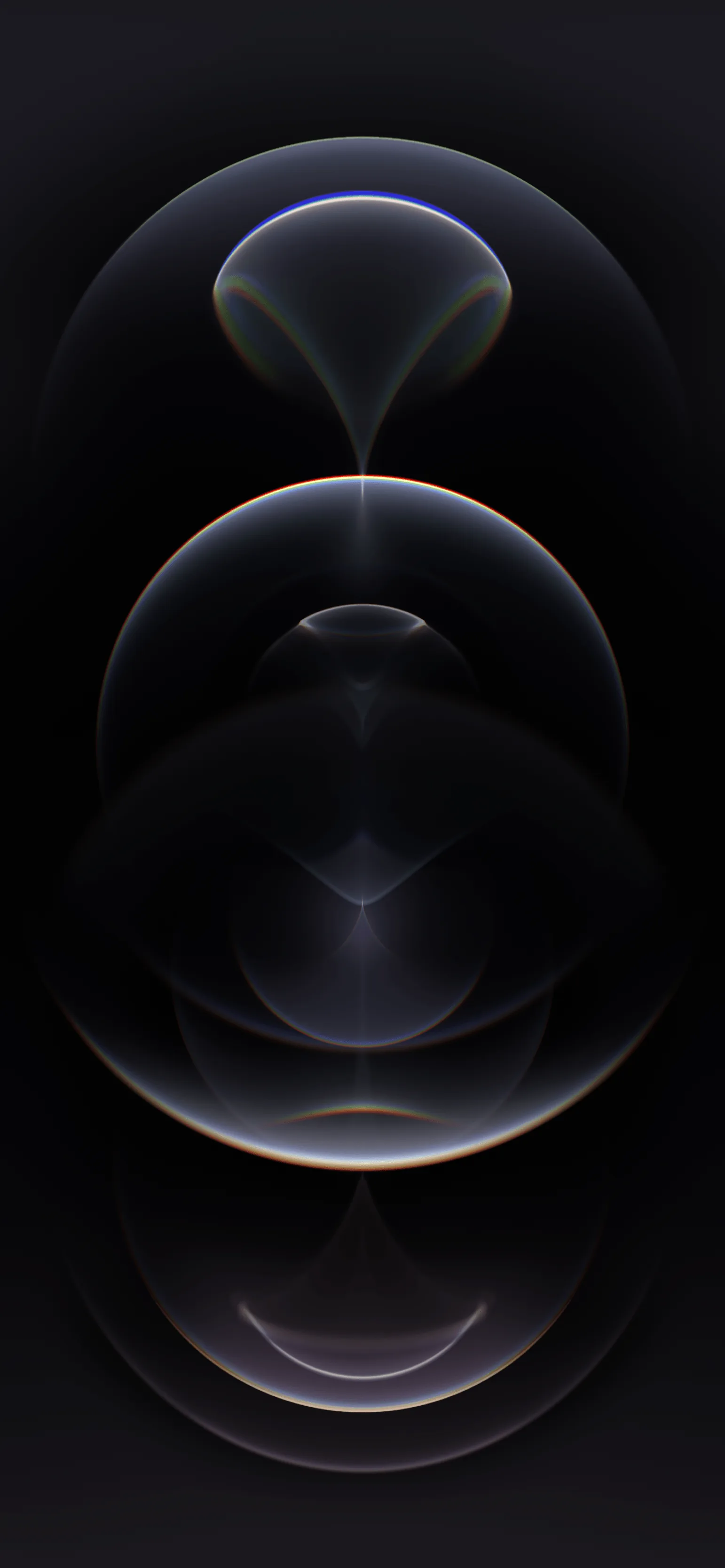 Three overlapping glass discs stack down the centre of the frame in the iPhone 12 stock style, their rims catching a thin rainbow edge.
