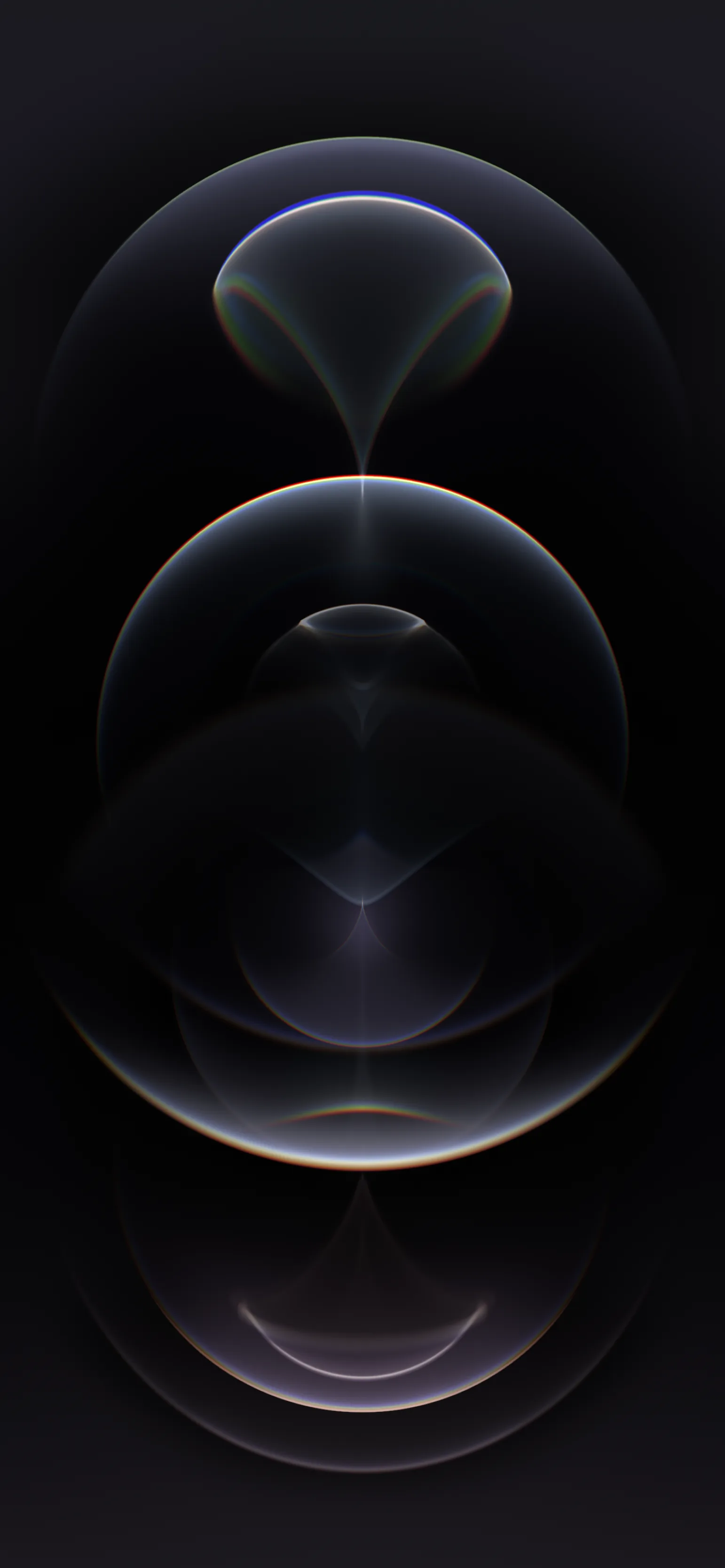 Three translucent spheres stack down a tall black frame, each rimmed with a thin band of colour where the light bends around it.