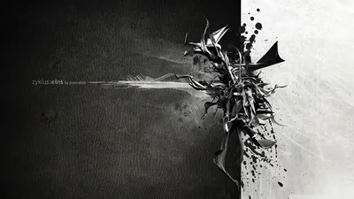 The frame splits down the middle into black and white halves, a winged figure bursting apart into shards where the two sides meet.