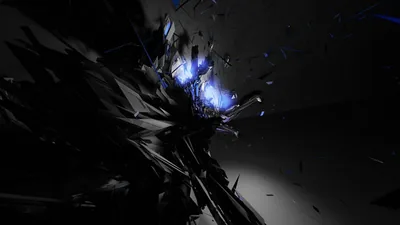 Splinters of black material blow apart around a point of blue-white light, the debris trailing off to the right.