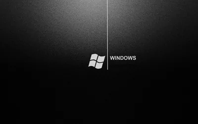 The window mark and name sit to the right of a thin vertical line on a textured black field.