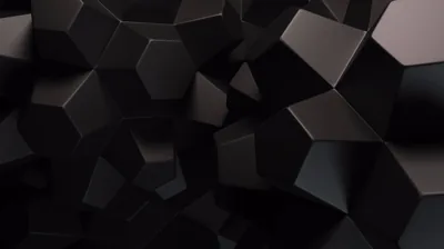 Chunky dark blocks pile up at different angles, each face shaded so the edges stay readable against each other.