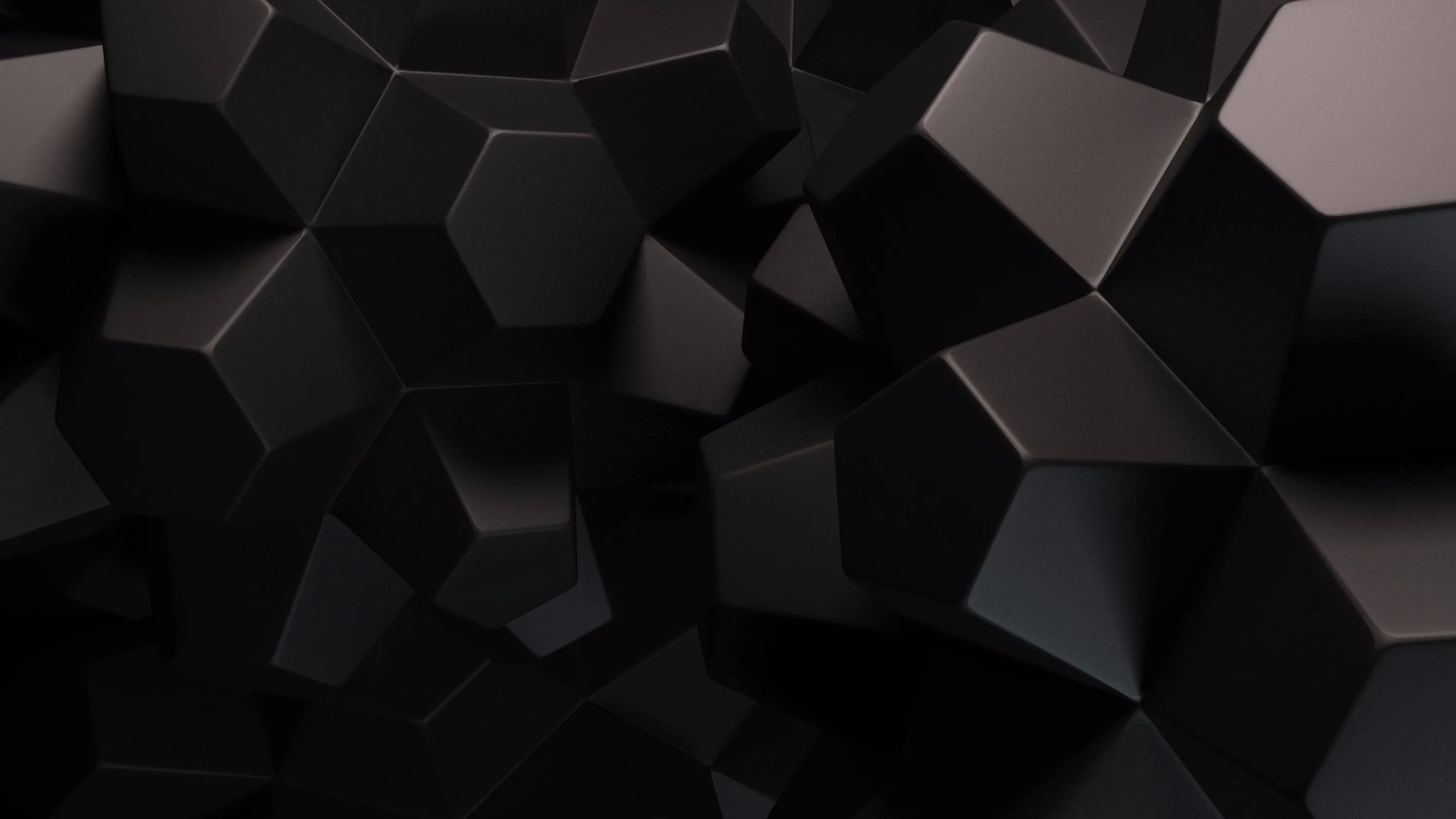 Chunky dark blocks pile up at different angles, each face shaded so the edges stay readable against each other.