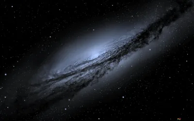A silver-grey galaxy tilts across a black sky, thick dust bands cutting dark stripes through its bright core.