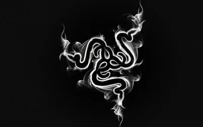 The three-snake emblem forms out of curling white smoke on black, wisps trailing off at the corners.