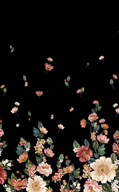 A painted meadow of cream, coral and pink blooms fills the bottom third of a tall black frame, with a few petals drifting loose into the empty space above.
