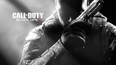 Key art for Call of Duty Black Ops 2 — a soldier raises a pistol beside the stacked white logo, faces kept in shadow under a grey sky.