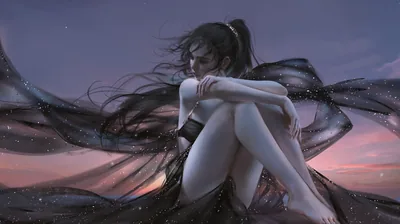 She sits hugging her knees on a pale ridge while a long black scarf and her hair stream out sideways against a dusty pink and blue evening sky.