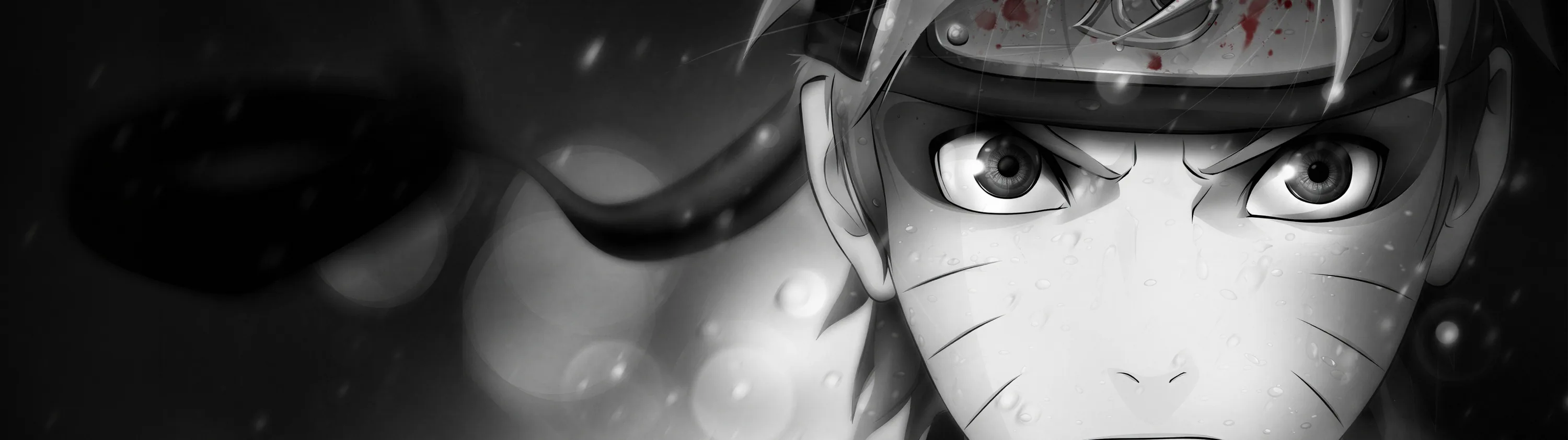 An ultra-wide crop holds Naruto's face in sharp monochrome, headband across his brow and the background blurred to soft grey.
