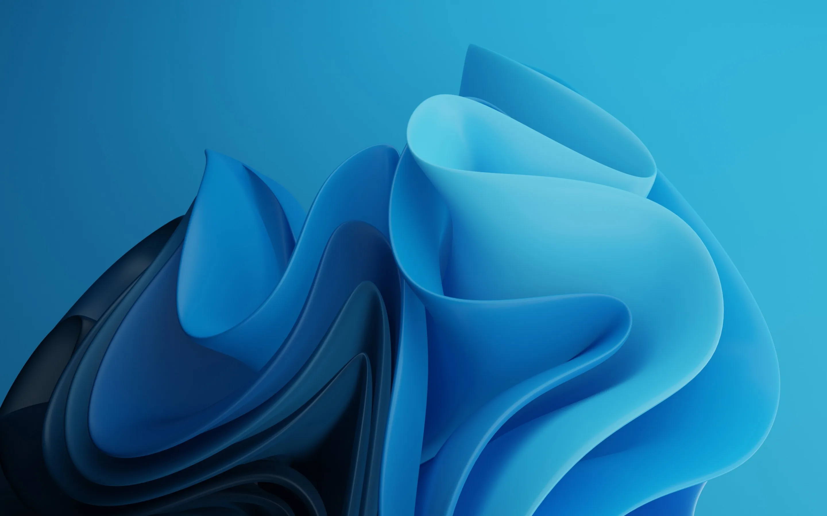 Sheets of light blue curl and fold into a soft peak on the right, a darker slab tucked behind them against a plain blue field.
