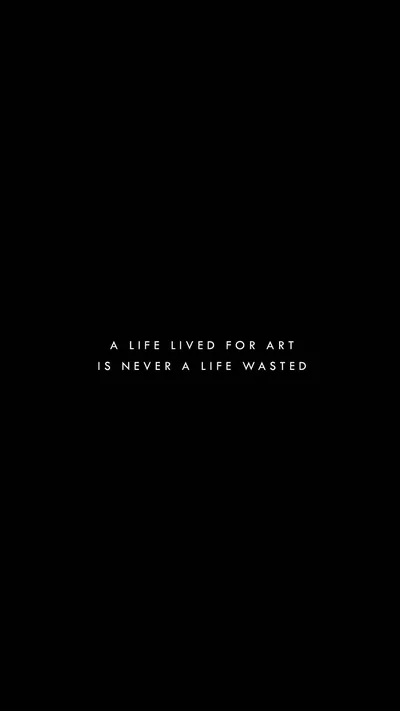 Two lines of thin white letter-spaced text sit just below centre on solid black, nothing else in the frame — good for OLED panels.