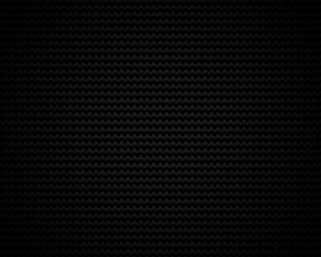 Fine zigzag rows weave across the whole frame like carbon fibre, a faint sheen at dead centre while all four corners drop to black.