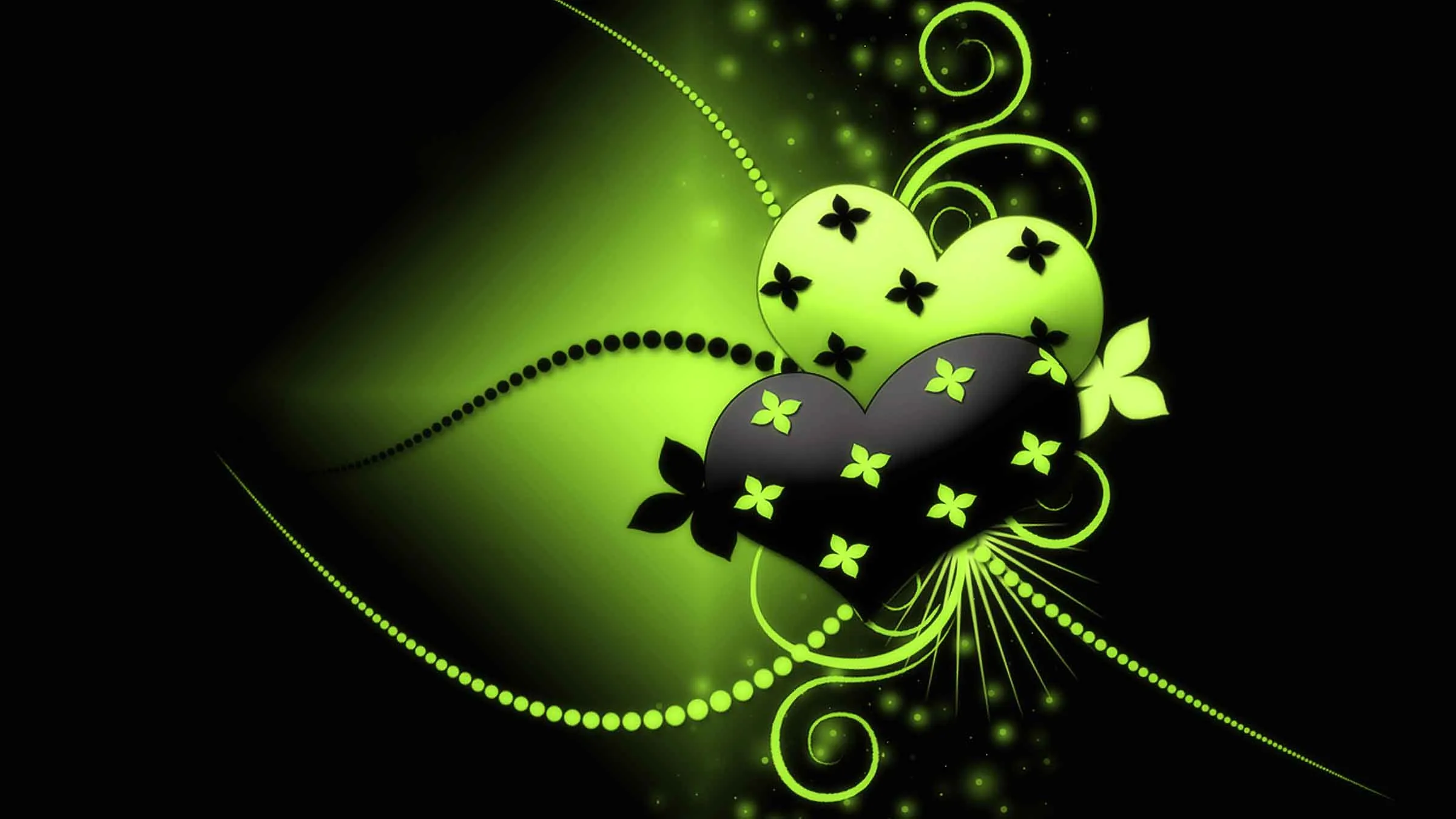 A lime and black heart sits in swirls of vine, dotted beads and small butterflies, glowing against a black backdrop.