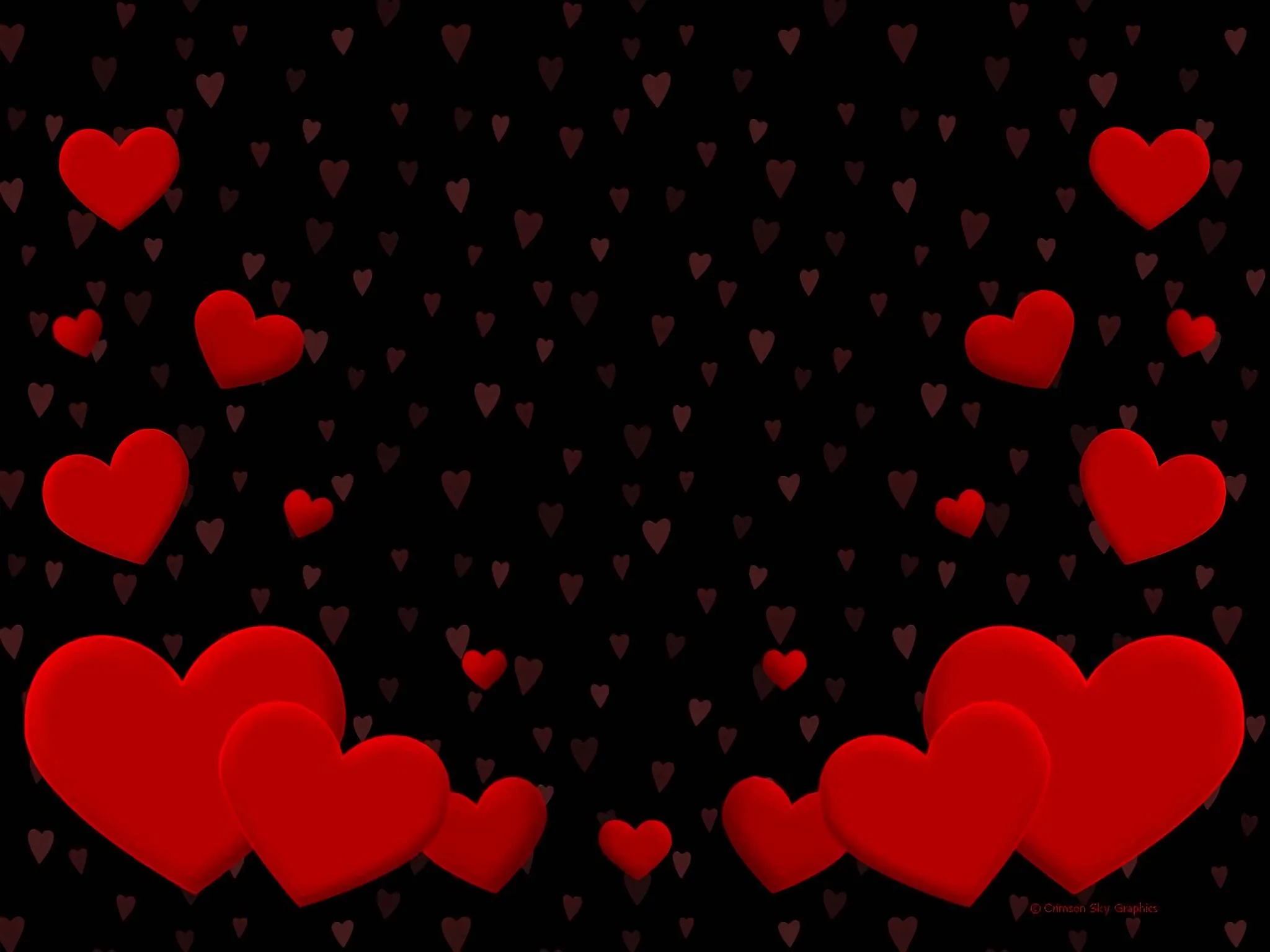 Bright red hearts of varying size drift across a black field, gathering into clusters in the two bottom corners with faint smaller ones between.