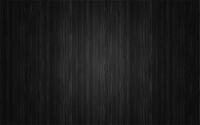 Fine vertical grain runs the full height of the frame in black and dark grey, a little brighter down the middle and darkened toward both sides.