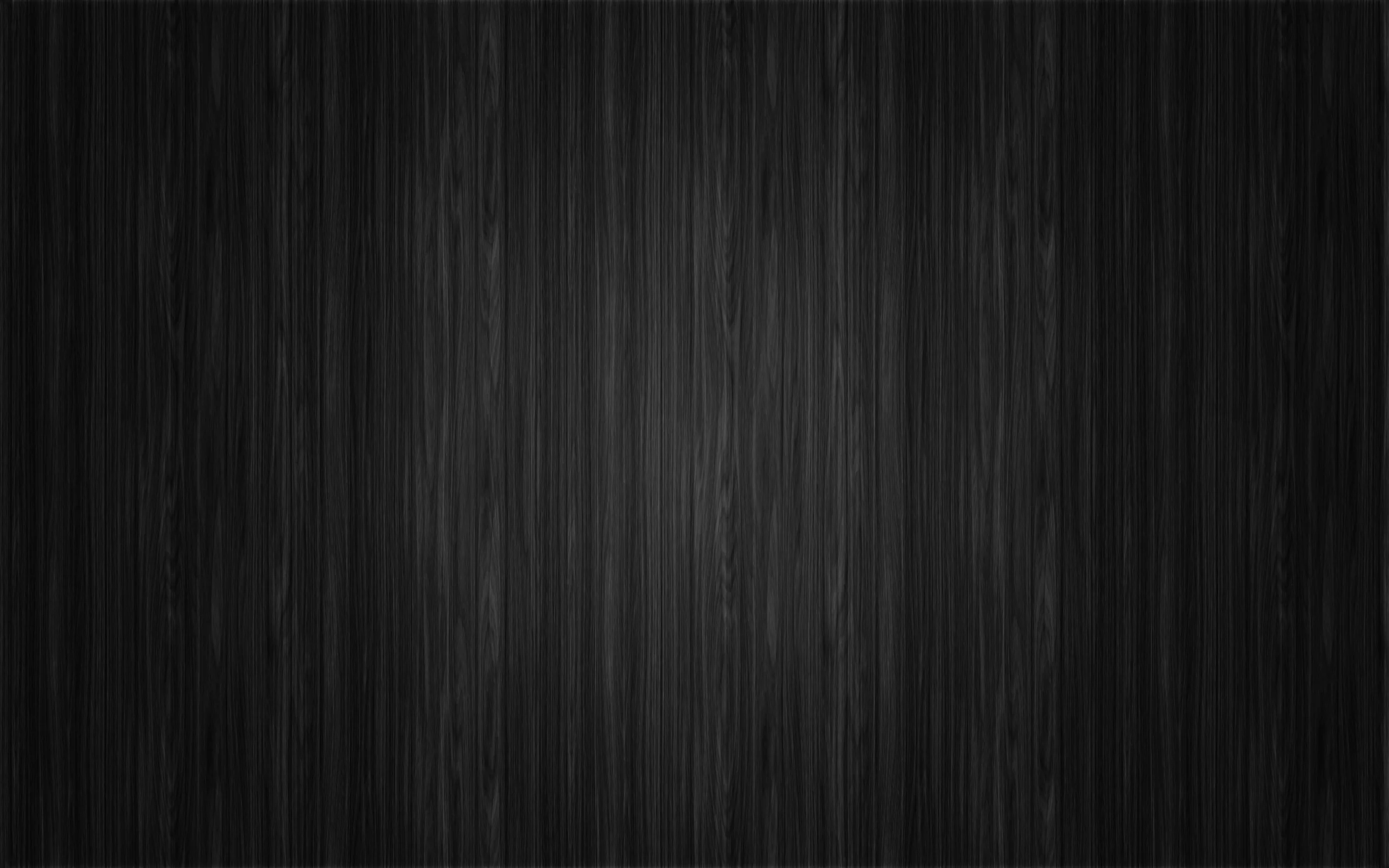Fine vertical grain runs the full height of the frame in black and dark grey, a little brighter down the middle and darkened toward both sides.