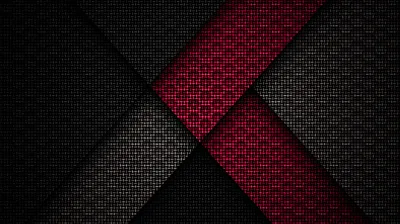 Overlapping carbon-weave panels form a wide X, one arm picked out in deep red against charcoal grey.